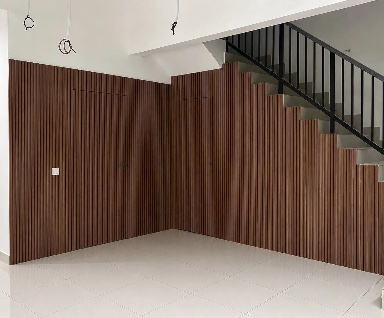 fluted wall panel with hidden door design picture